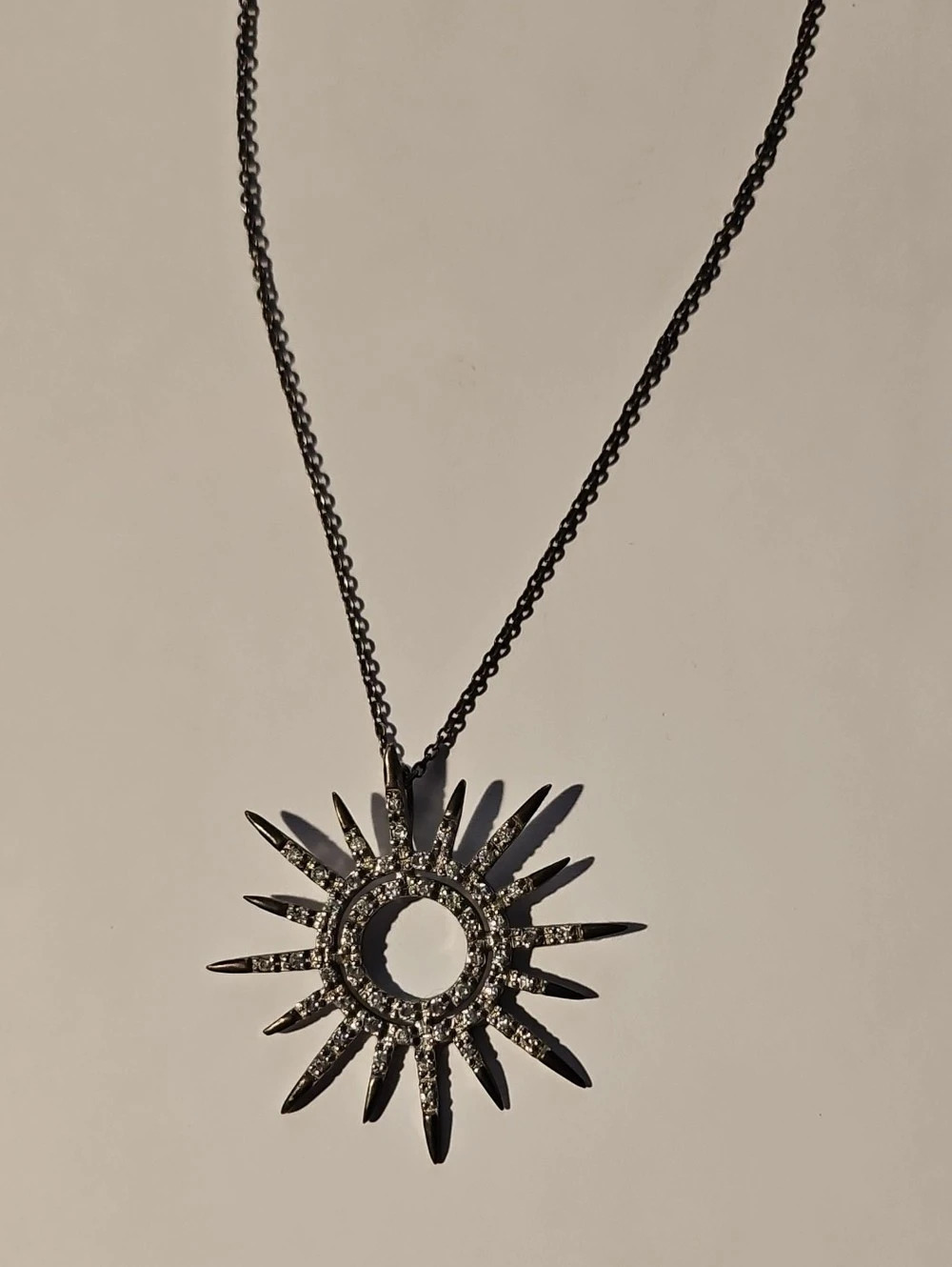 Sunburst Pendant Necklace in Black & Silver Like New